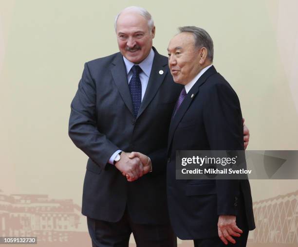 Belarussian President Alexander Lukashenko greets Kazakh President Nursultan Nazarbayev during the Session of the Council on Collective Security of...