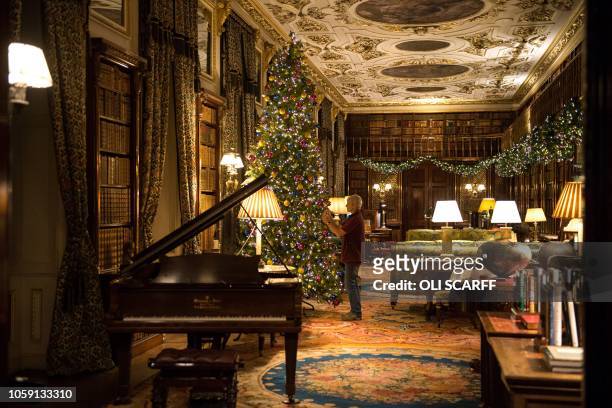 The rooms of Chatsworth House are decorated for their Christmas season as various fairy tale scenes in the theme of 'Once Upon a Time', during a...