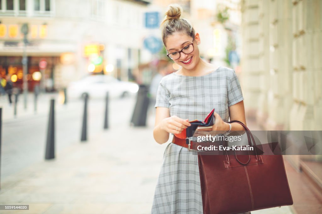 Young woman is having fun in the city - autumn mood