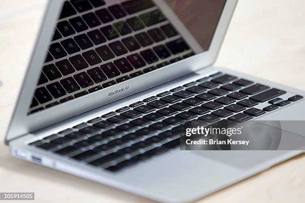 The new 11-inch MacBook Air is displayed at the new Apple Store during a media preview on October 21, 2010 in Chicago, Illinois. The new store opens...