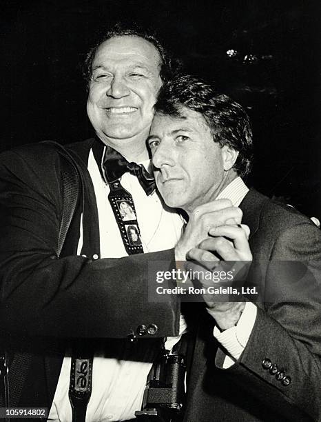 Ron Galella and Dustin Hoffman during Smile Party - November 24, 1986 at Club 4-D in New York City, New York, United States.