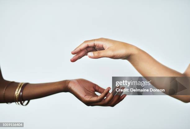 beautifully soft hands are within your reach - finger touching stock pictures, royalty-free photos & images