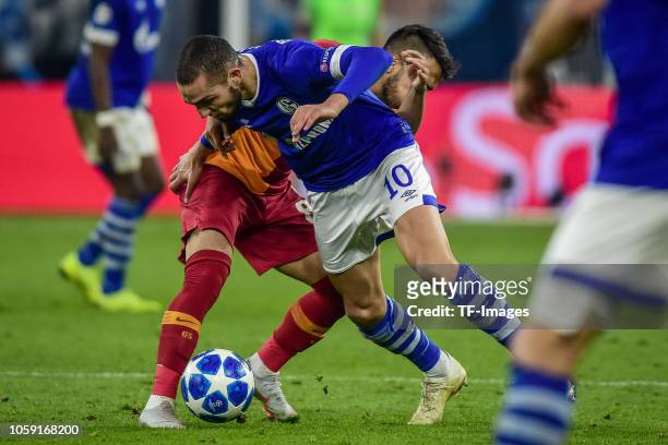 Nabil Bentaleb of Schalke and Selcuk Inan of Galatasaray battle for the ball during the Group D match of the UEFA Champions League between FC Schalke...