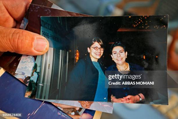 The uncle of Rashida Tlaib, the winner of Michigan's 13th congressional district in the 2018 US general election, displays a picture of her with...