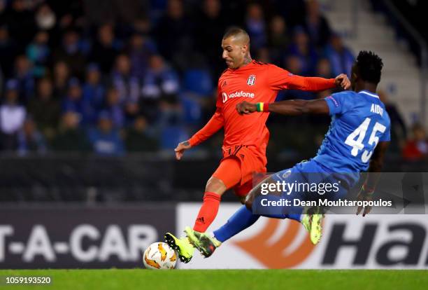 Ricardo Quaresma of Besiktas beats Joseph Aidoo of KRC Genk as he scores his team's first goal during the UEFA Europa League Group I match between...