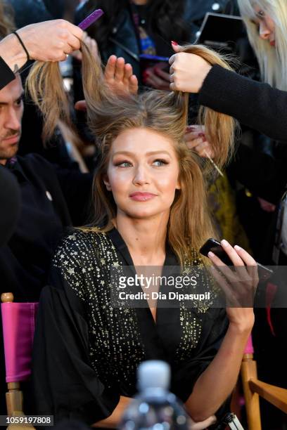 Gigi Hadid prepares backstage during 2018 Victoria's Secret Fashion Show in New York at Pier 94 on November 8, 2018 in New York City.