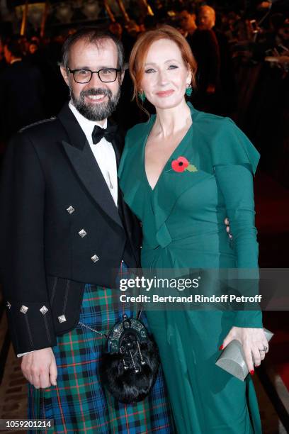 Scriptwriter and Producer of the movie J.K. Rowling and her husband Neil Michael Murray attend the "Fantastic Beasts: The Crimes of Grindelwald"...