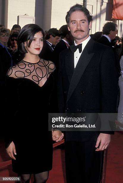 Phoebe Cates and Kevin Kline during 61st Annual Academy Awards - Arrivals at Shrine Auditorium in Los Angeles, California, United States.