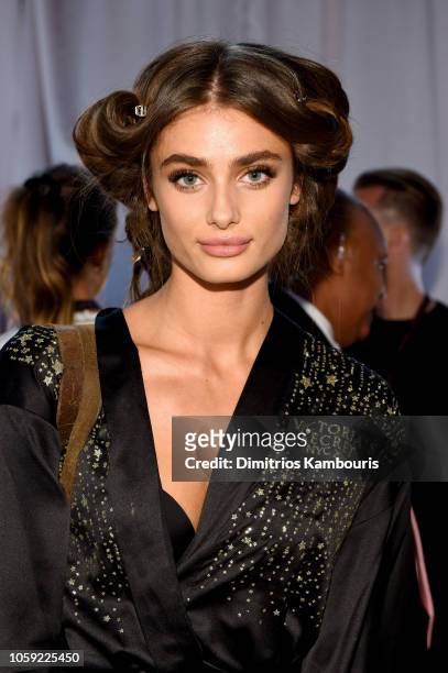 Taylor Hill prepares backstage during the 2018 Victoria's Secret Fashion Show in New York at Pier 94 on November 8, 2018 in New York City.