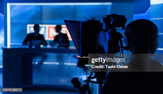 Newsreaders In Television Studio Newsreaders In Television Studio