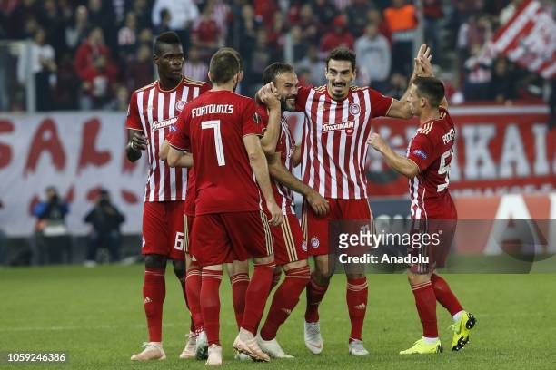 Lazaros Christodoulopoulos of Olympiacos celebrates with team mates after scoring a goal during the UEFA Europa League Group F match between...
