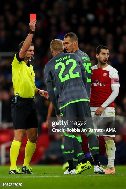 Jeremy Mathieu of Sporting CP receives a straight red card during the UEFA Europa League Group E match between Arsenal and Sporting CP at Emirates...