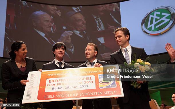 Head coach Joachim Loew, goalkeeper coach Andreas Koepke and Manager Oliver Bierhoff of the German national football team get a ticket for the FIFA...