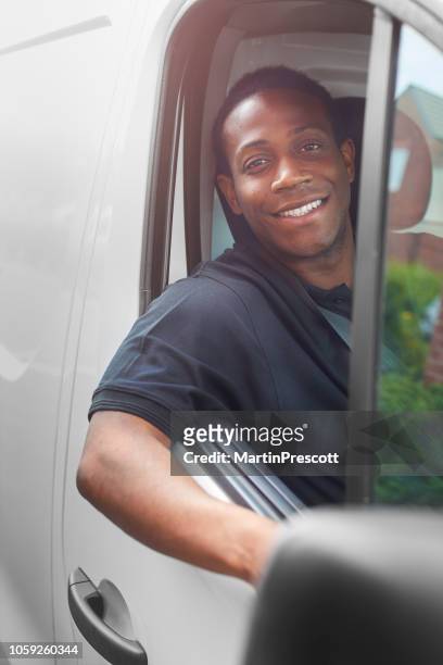 tradesman sitting in his van - tradesman toolkit stock pictures, royalty-free photos & images