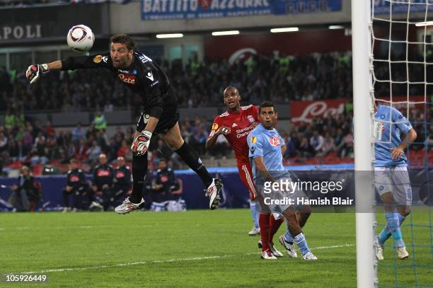 Morgan De Sanctis of Napoli dives to save a shot from David Ngog of Liverpool during the UEFA Europa League match between SSC Napoli and Liverpool...