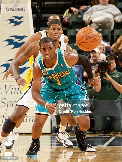 Chris Paul of the New Orleans Hornets shoots the ball during a game against the Indiana Pacers on October 15, 2010 at Conseco Fieldhouse in...