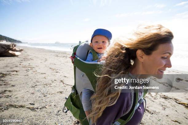 a mom and son on a hike. - baby on the move stock pictures, royalty-free photos & images