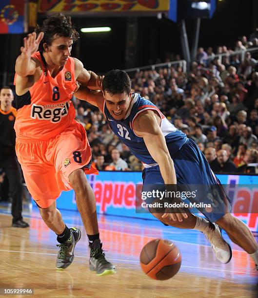 Goran Vrbanc, #32 of Cibona Zagreb competes with Victor Sada, #8 of Regal FC Barcelona during the Turkish Airlines Euroleague Regular Season 2010...