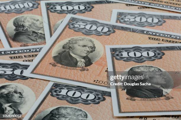 close-up of multiple savings bonds - us treasury stock pictures, royalty-free photos & images
