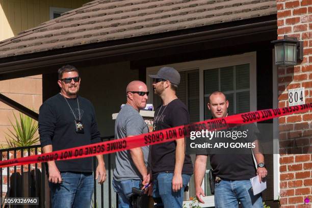 Agents collecting evidence at the home of suspected nightclub shooter Ian David Long in Thousand Oaks, northwest of Los Angeles, on November 8, 2018....