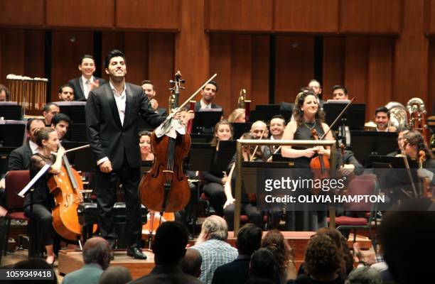 Iranian-Austrian cellist Kian Soltani , who plays on a 1680 cello by the brothers Giovanni and Francesco Grancino, and Miriam Manasherov stand after...
