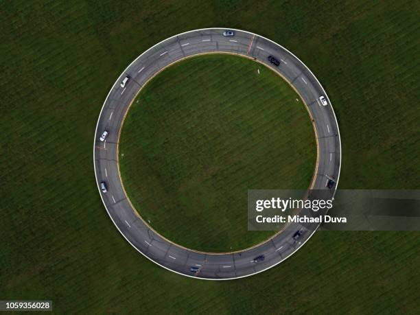 photo manipulated traffic circle w no exit - top view road stock pictures, royalty-free photos & images