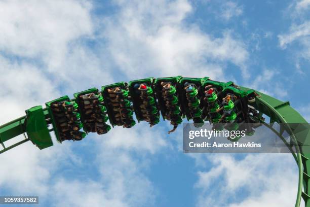 upside down in the clouds - roller coaster - universal studios florida stock pictures, royalty-free photos & images