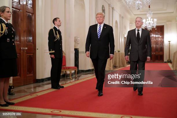 President Donald Trump and Defense Secretary James Mattis arrive for an event commemorating the 35th anniversary of attack on the Beirut Barracks in...