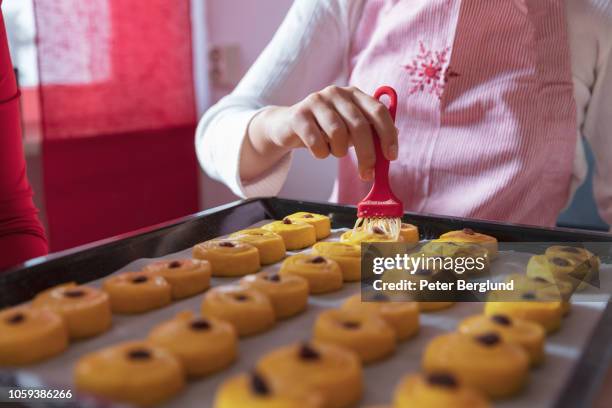 girl making swedish lussekatter - swedish saffron braid stock pictures, royalty-free photos & images