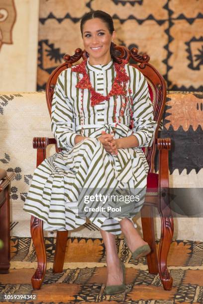 Meghan, Duchess of Sussex visits an exhibition of Tongan handicrafts, mats and tapa cloths at the Fa'onelua Convention Centre on October 26, 2018 in...