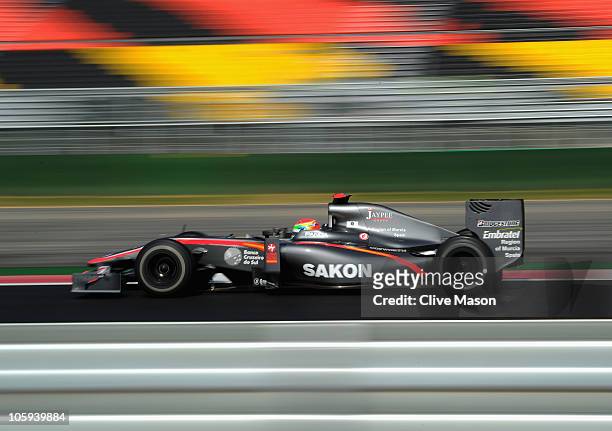 Sakon Yamamoto of Japan and Hispania Racing Team drives during practice for the Korean Formula One Grand Prix at the Korea International Circuit on...