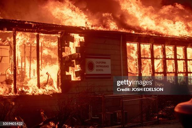 Paradise Elementary School burns down as the Camp fire tears through Paradise, California on November 8, 2018. - More than 18,000 acres have been...