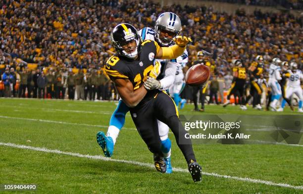 Captain Munnerlyn of the Carolina Panthers breaks up a pass intended for JuJu Smith-Schuster of the Pittsburgh Steelers during the third quarter in...