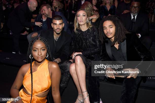 Justine Skye, Miles Richie, Alana Hadid, and Luka Sabbat attend the 2018 Victoria's Secret Fashion Show in New York at Pier 94 on November 8, 2018 in...