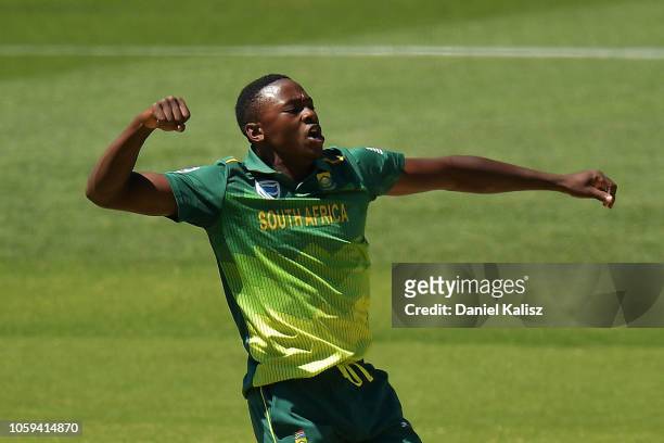 Kagiso Rabada of South Africa celebrates after taking the wicket of Shaun Marsh of Australia during game two of the One Day International series...