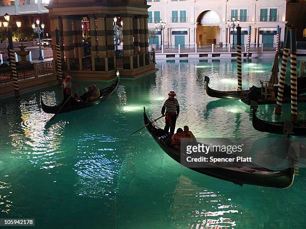 Gondolier gives tourists a ride at the Venetian Las Vegas Hotel Casino on October 21, 2010 in Las Vegas, Nevada. Nevada once had among the lowest...