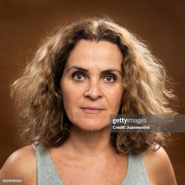 serious mature woman (no make up) - no make up stock pictures, royalty-free photos & images