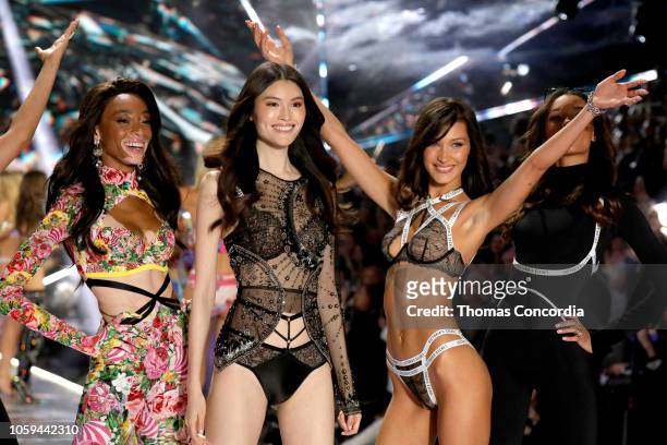 Winnie Harlow, Sui He, and Bella Hadid walk the runway in the 2018 Victoria's Secret Fashion Show at Pier 94 on November 8, 2018 in New York City.