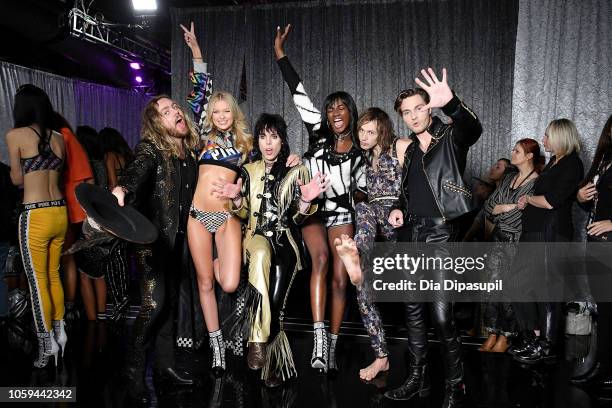 Adam Slack, Maggie Laine, Luke Spiller, Zuri Tibby, Gethin Davies and Jed Elliott pose backstage during the 2018 Victoria's Secret Fashion Show at...