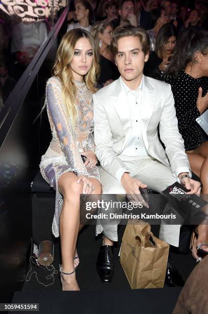 Delilah Belle Hamlin and Dylan Sprouse attend the 2018 Victoria's Secret Fashion Show in New York at Pier 94 on November 8, 2018 in New York City.