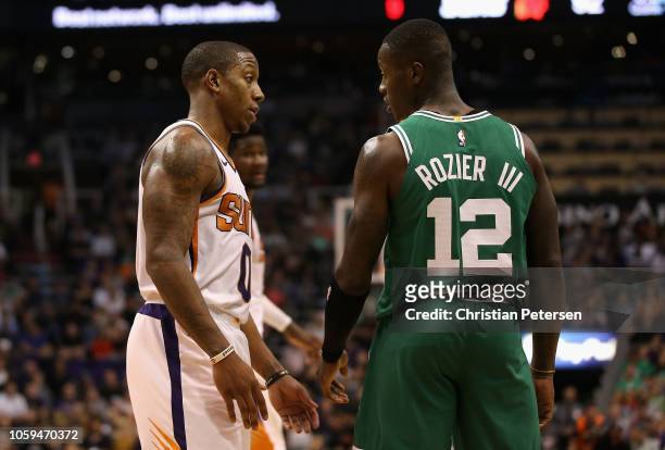 Isaiah Canaan of the Phoenix Suns reacts to Terry Rozier of the Boston Celtics during the second half of the NBA game at Talking Stick Resort Arena...