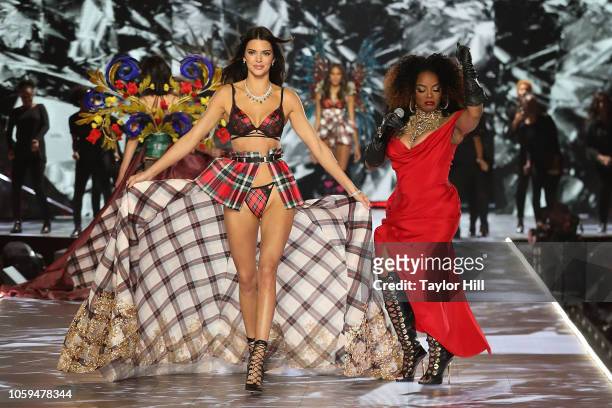Kendall Jenner walks the runway as Leela James performs during the 2018 Victoria's Secret Fashion Show at Pier 94 on November 8, 2018 in New York...
