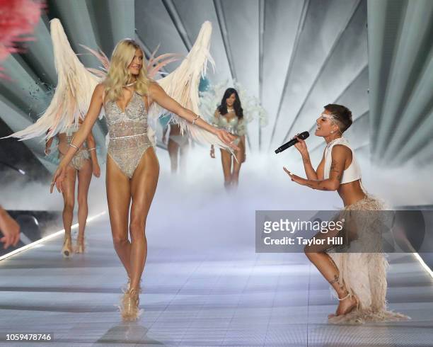Devon Windsor walks the runway as Halsey performs during the 2018 Victoria's Secret Fashion Show at Pier 94 on November 8, 2018 in New York City.
