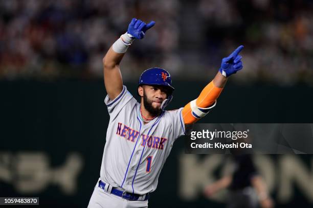 Infielder Amed Rosario of the New York Mets celebrates hitting a solo homer to make it 1-0 in the top of 3rd inning during the game one of the Japan...