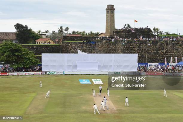 England bowler Moeen Ali catches Sri Lanka batsman Dimuth Karunaratne off his own bowling during Day Four of the First Test match between Sri Lanka...