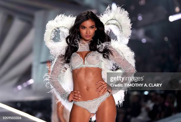 Swedish model Kelly Gale walks the runway at the 2018 Victoria's Secret Fashion Show on November 8, 2018 at Pier 94 in New York City. - Every year,...