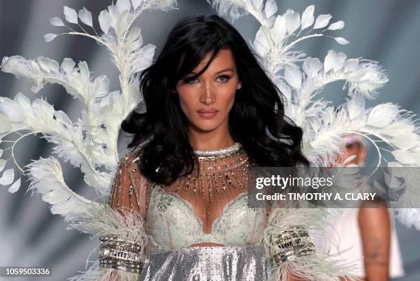 Model Bella Hadid walks the runway at the 2018 Victoria's Secret Fashion Show on November 8, 2018 at Pier 94 in New York City. - Every year, the...