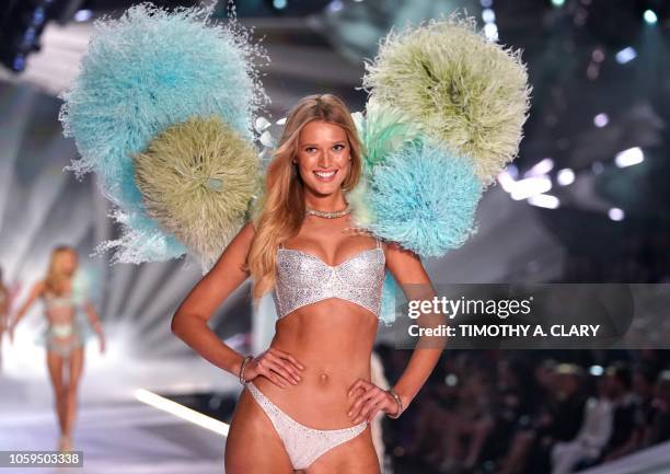 German model Toni Garrn walks the runway at the 2018 Victoria's Secret Fashion Show on November 8, 2018 at Pier 94 in New York City. - Every year,...