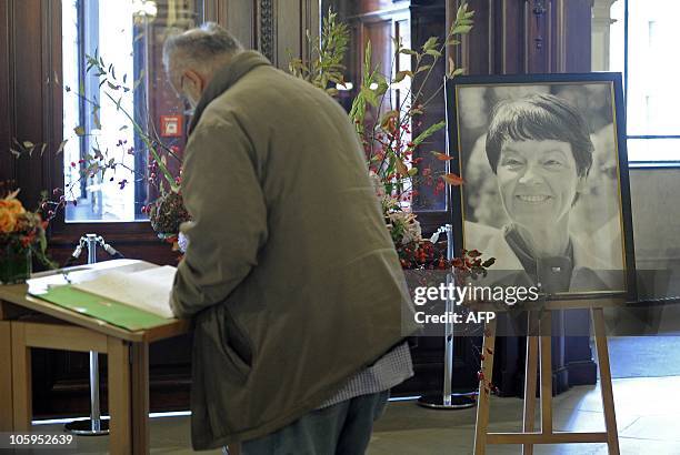 Man signs a book of condolence for Hannelore "Loki" Schmidt at the City Hall of Hamburg, northern Germany, on October 22, 2010. Hannelore Schmidt,...