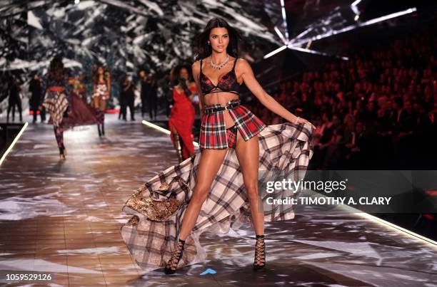 Model Kendall Jenner walks the runway at the 2018 Victoria's Secret Fashion Show on November 8, 2018 at Pier 94 in New York City. - Every year, the...